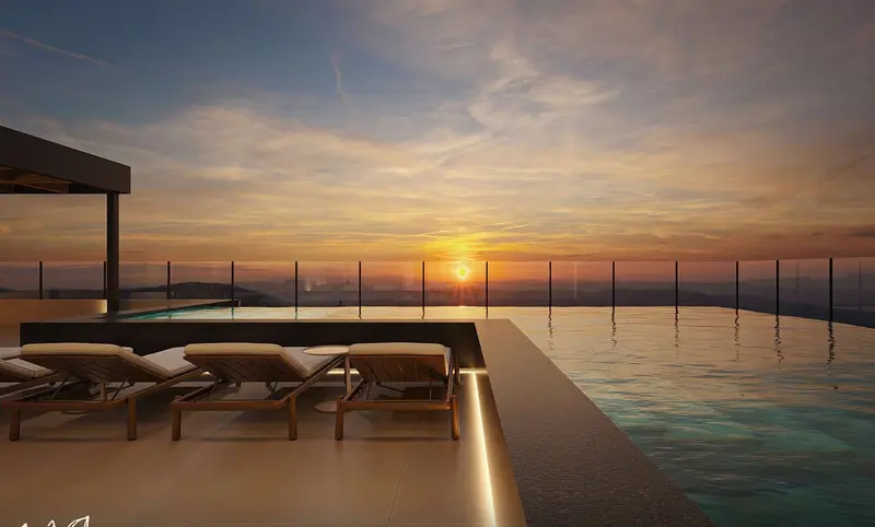 Piscina de borda infinita na cobertura do Residencial Park Avenue com vista para o mar de Praia Grande